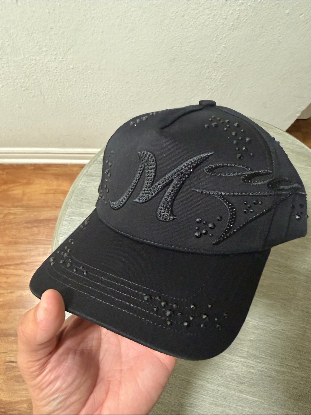 “El Mago” Embellished Black Baseball Cap with 'M' Accent